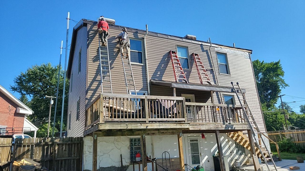 workers on the roof