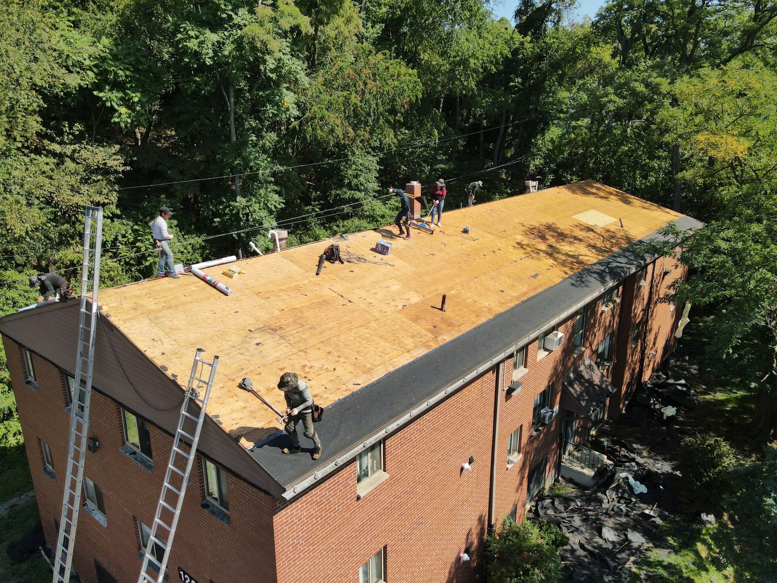 workers on the roof