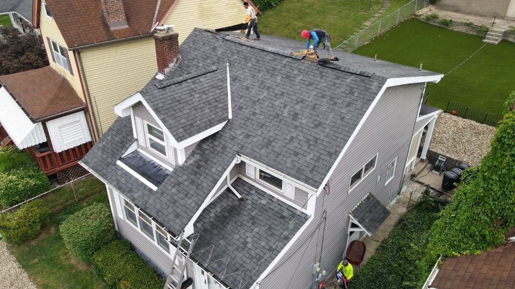 A shingled roof with energy efficient shingles.