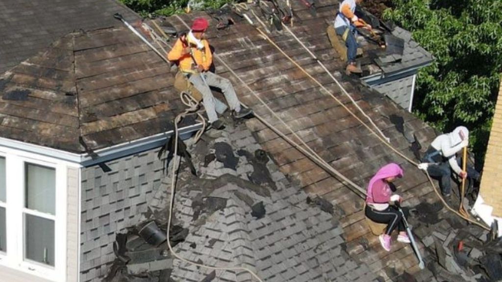Roofing professionals performing roof renovations when it’s time to replace roof.