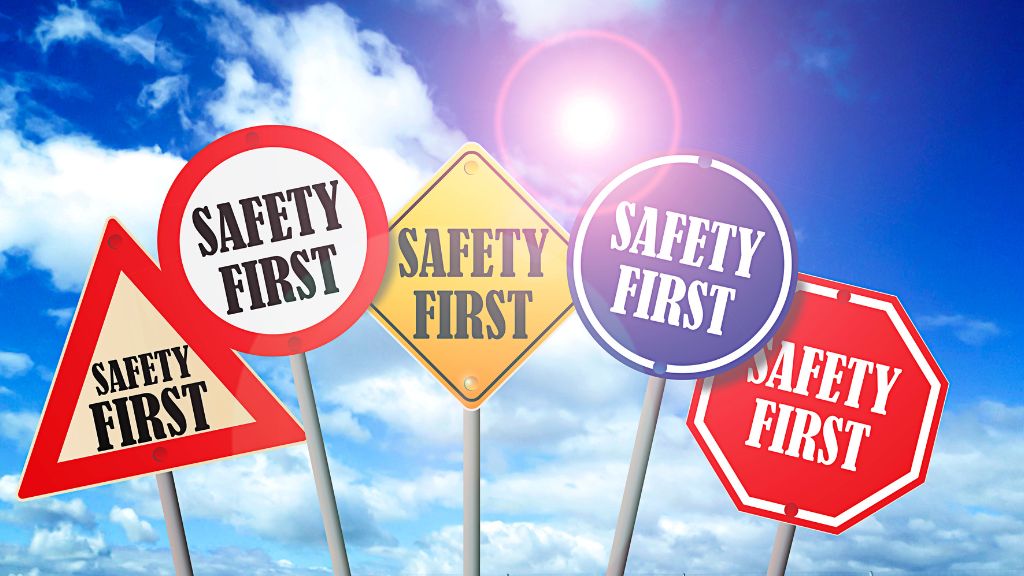 multi-colored safety first signs.