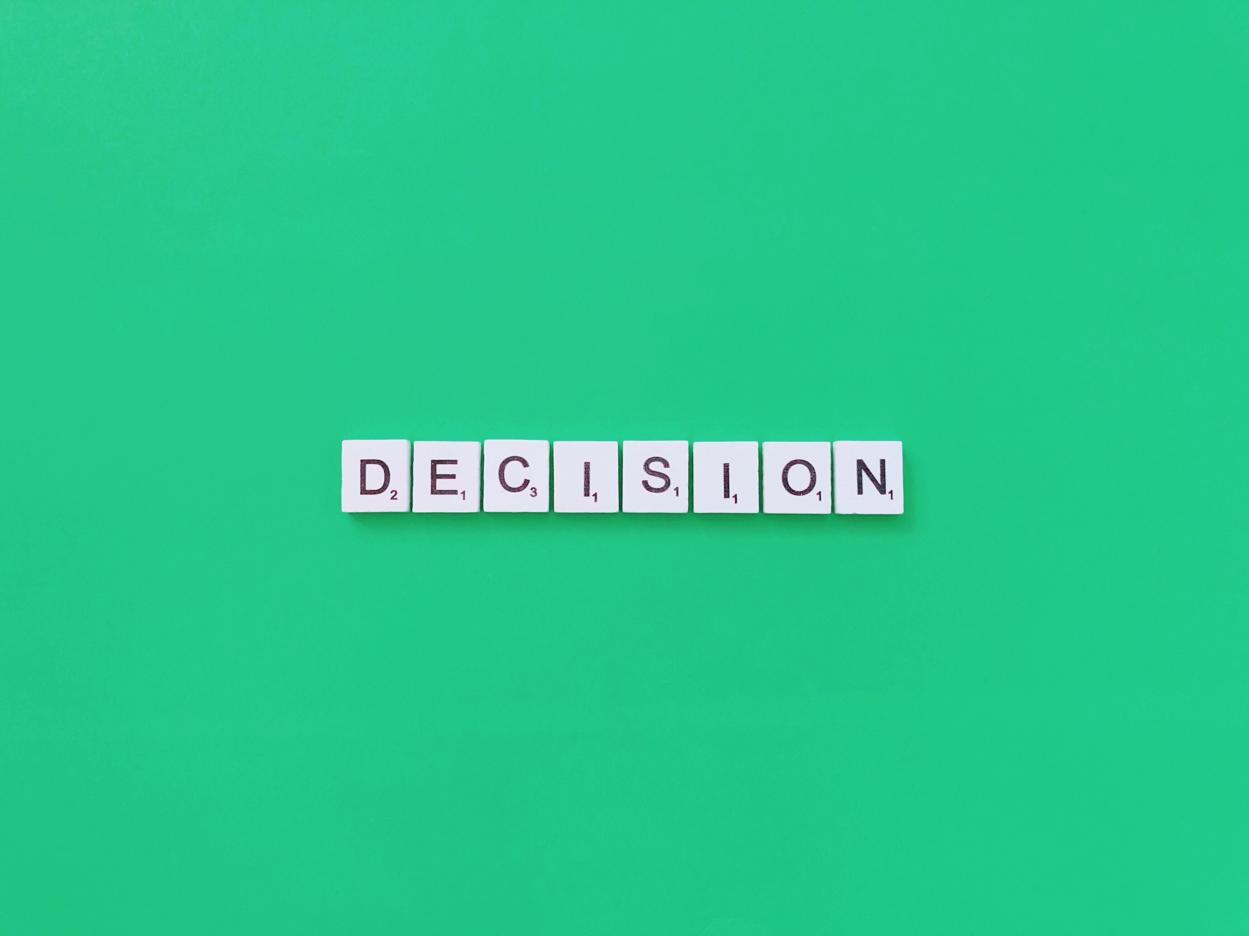 A sign with the word decision on it.